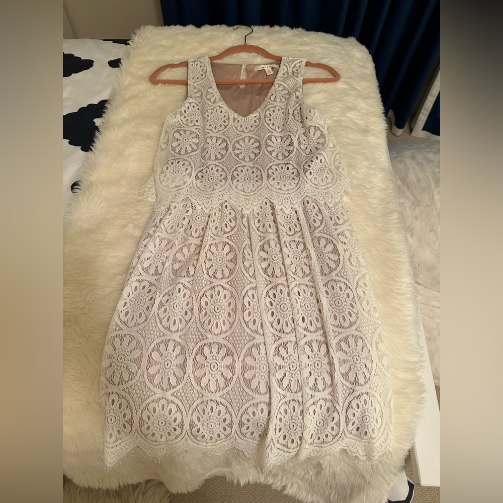 Miami from Francesca’s white lace dress